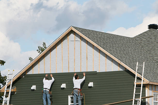 Professional Emergency Siding Repair technician working in Oakland, NJ